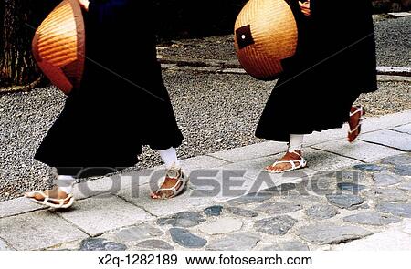 Stock Photo - Shinto Monks wearing straw sandals at Daitokuji in Kyoto Japan. Fotosearch