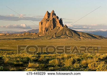 Shiprock at sunrise, Exposed Volcanic Plug 7178 feet high, Northern New Mexico, USA View Large Photo Image Stock Photo - Shiprock at sunrise, Exposed Volcanic Plug 7178 feet high, Northern New Mexico, USA. Fotosearch