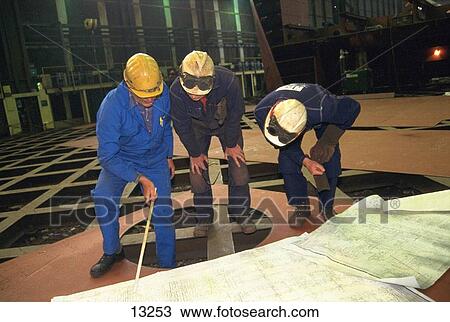 Stock Image - Shipyard workers. Fotosearch
