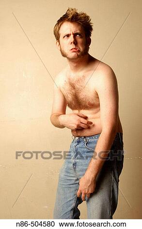 Stock Image - Shirtless man, confused gesture. Fotosearch