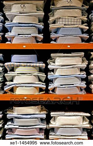 Stock Photography - shirts, Lacoste, boutique Jordi Meseguer, Barcelona, Catalonia, Spain.. Fotosearch