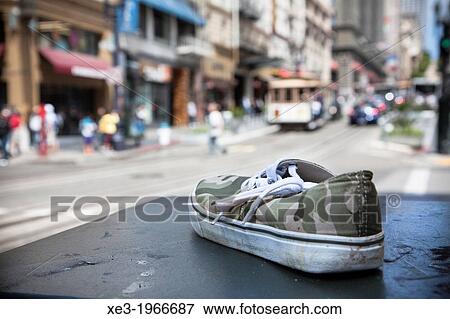 Stock Photo - Shoe on the street, Powell Street, San Francisco.. Fotosearch