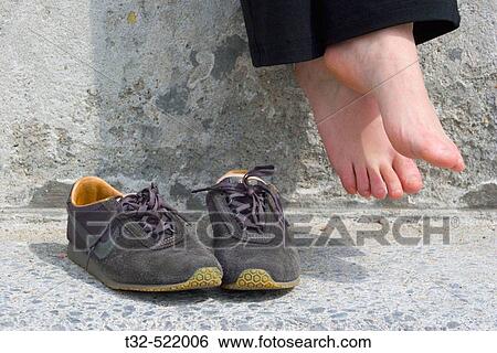Shoes and feet View Large Photo Image Stock Photograph - Shoes and feet. Fotosearch