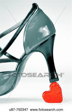 Stock Photo - Shoes and Heart Shape on the Floor. Fotosearch