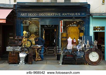 Shop selling decorative antiques along Portobello Road West London England UK View Large Photo Image Stock Image - Shop selling decorative antiques along Portobello Road West London England UK. Fotosearch