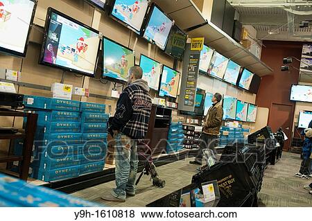 Shoppers browse flat-screen televisions in a Best Buy in the Elmhurst neighborhood in the borough of Queens in New York over the Black Friday weekend View Large Photo Image Stock Photo - Shoppers browse flat-screen televisions in a Best Buy in the Elmhurst neighborhood in the borough of Queens in New York over the Black Friday weekend. Fotosearch