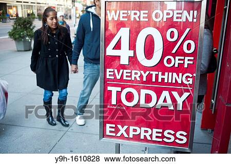 Shoppers enter the Express store in the Herald Square shopping district in New York looking for bargains on Thanksgiving Day Many retailers are opening their doors on Thanksgiving or opening up for Black Friday the night before View Large Photo Image Stock Photo - Shoppers enter the Express store in the Herald Square shopping district in New York looking for bargains on Thanksgiving Day Many retailers are opening their doors on Thanksgiving or opening up for Black Friday the night before. Fotosearch