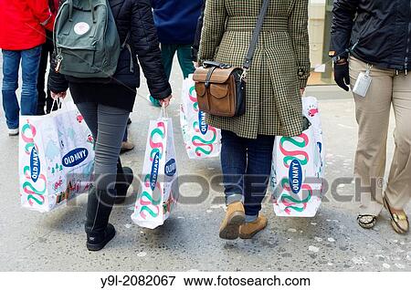 Shoppers in Herald Square outside Macy's Herald Square flagship store in New York looking for bargains on Black Friday, the day after Thanksgiving, Friday. View Large Photo Image Stock Photo - Shoppers in Herald Square outside Macy's Herald Square flagship store in New York looking for bargains on Black Friday, the day after Thanksgiving, Friday.. Fotosearch