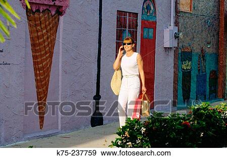 Stock Photo - Shopping and talking. Fotosearch