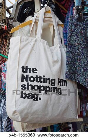 Stock Photo - Shopping bags for sale Notting Hill district London England UK Europe. Fotosearch