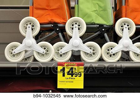 Stock Photography - Shopping carts for sale in a supermarket, France. Fotosearch