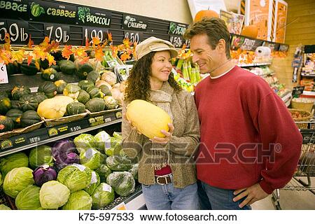 Stock Image - Shopping for produce. Fotosearch