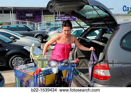 Shopping in a supermarket, model release. View Large Photo Image Picture - Shopping in a supermarket, model release.. Fotosearch