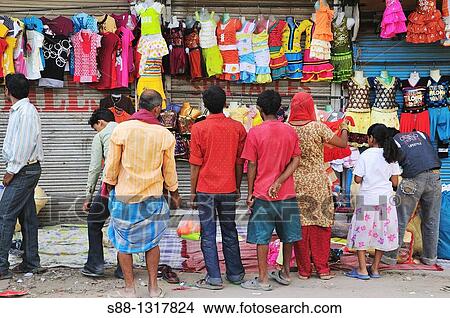 Picture - Shopping on the street market, Delhi India. Fotosearch