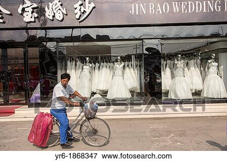 Stock Photo - Shops selling western style wedding gowns in Suzhou, China Suzhou is one of the largest producers of wedding dresses in the world. Fotosearch