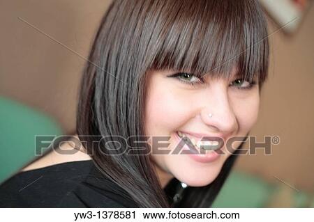Shot of beautiful teen girl with big eyes View Large Photo Image Stock Image - Shot of beautiful teen girl with big eyes. Fotosearch