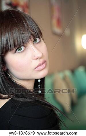 shot of beautiful teen girl with big eyes inside View Large Photo Image Stock Photo - shot of beautiful teen girl with big eyes inside. Fotosearch