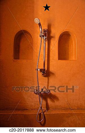 Stock Photo - Shower in moroccan bathroom with tadelak painted walls, Moroccan Riad, inside, Marrakech, Morocco.. Fotosearch