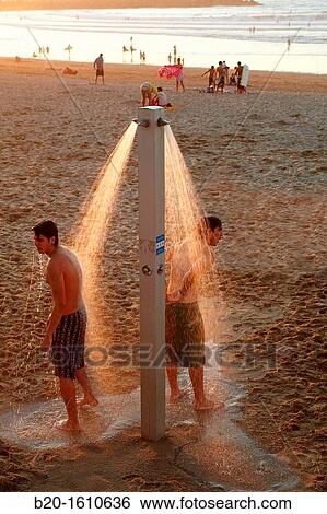 Shower, Zurriola Beach, Donostia, San Sebastian, Gipuzkoa, Basque Country, Spain View Large Photo Image Stock Photograph - Shower, Zurriola Beach, Donostia, San Sebastian, Gipuzkoa, Basque Country, Spain. Fotosearch