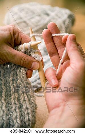 Showing the? knit? Stitch Hands holding yarn in? American Style? knitting position View Large Photo Image Stock Image - Showing the? knit? Stitch Hands holding yarn in? American Style? knitting position. Fotosearch