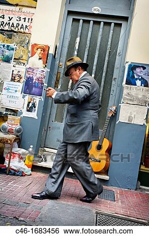 Showman at the San Telmo antique street market, Buenos Aires, Argentina. View Large Photo Image Stock Photograph - Showman at the San Telmo antique street market, Buenos Aires, Argentina.. Fotosearch