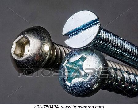 Shown clockwise from left, hex, flathead & phillips-head screws illustrate choices available to a manual worker View Large Photo Image Picture - Shown clockwise from left, hex, flathead & phillips-head screws illustrate choices available to a manual worker. Fotosearch