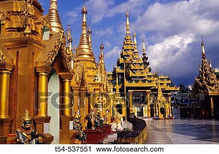 Shrines of the Shwedagon pagoda in the evening light. Yangoon, Myanmar View Large Photo Image Stock Image - Shrines of the Shwedagon pagoda in the evening light. Yangoon, Myanmar. Fotosearch
