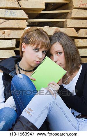 Shy schoolgirls View Large Photo Image Stock Photo - Shy schoolgirls. Fotosearch