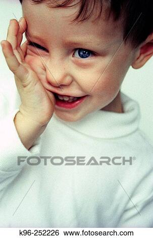 Stock Photograph - Shy Toddler. Fotosearch
