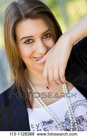 Shy woman portrait View Large Photo Image Stock Photo - Shy woman portrait. Fotosearch