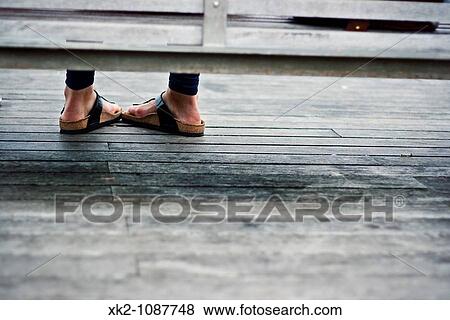 Shy woman waiting View Large Photo Image Stock Photo - Shy woman waiting. Fotosearch