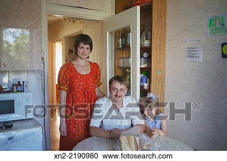 Siberian family at home in their apartment in Tobolsk, Tyumen Oblast, Siberia, Russia. View Large Photo Image Stock Image - Siberian family at home in their apartment in Tobolsk, Tyumen Oblast, Siberia, Russia.. Fotosearch