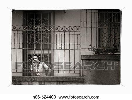 Sicilian man on porch smoking View Large Photo Image Stock Image - Sicilian man on porch smoking. Fotosearch