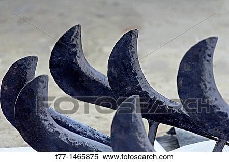 Sickle for Sell at Market, Miao, Arunachal Pradesh, India View Large Photo Image Stock Photography - Sickle for Sell at Market, Miao, Arunachal Pradesh, India. Fotosearch