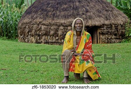 Sidama Tribe Ethiopia Africa old man age 82 with his hut home with scarf in Lower Omo Valley 30 View Large Photo Image Stock Image - Sidama Tribe Ethiopia Africa old man age 82 with his hut home with scarf in Lower Omo Valley 30. Fotosearch