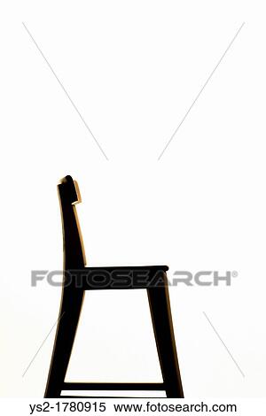 Side view of empty wooden chair on white background View Large Photo Image Stock Photography - Side view of empty wooden chair on white background. Fotosearch