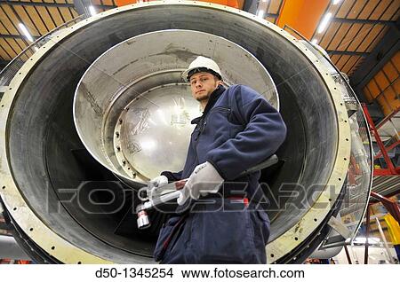 Picture - Siemens turbine factory worker, Finspong, Sweden. Fotosearch