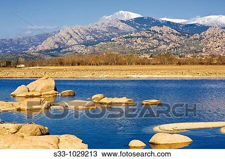 Sierra de Guadarrama y La Pedriza desde el embalse de Santillana Comunidad de Madrid Espaa View Large Photo Image Stock Image - Sierra de Guadarrama y La Pedriza desde el embalse de Santillana Comunidad de Madrid Espaa. Fotosearch