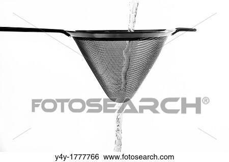 Sieve with water stream isolated on white background View Large Photo Image Stock Photograph - Sieve with water stream isolated on white background. Fotosearch