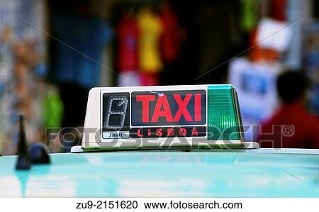 Sign on roof of a Lisbon taxi, Portugal, Europe. View Large Photo Image Stock Image - Sign on roof of a Lisbon taxi, Portugal, Europe.. Fotosearch