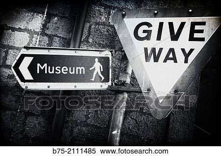 Sign post indication of a museum and trafic signal of Give way in Grassington, Yorkshire Dales, England, UK, Europe. View Large Photo Image Stock Photography - Sign post indication of a museum and trafic signal of Give way in Grassington, Yorkshire Dales, England, UK, Europe.. Fotosearch