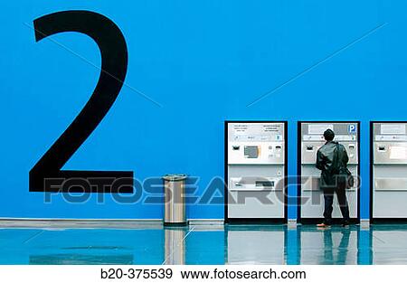 Signposting and automatic cashiers for paying the car park. Hall. Bilbao Exhibition Center (BEC). Barakaldo. Bizkaia. Euskadi. Spain View Large Photo Image Stock Photo - Signposting and automatic cashiers for paying the car park. Hall. Bilbao Exhibition Center (BEC). Barakaldo. Bizkaia. Euskadi. Spain. Fotosearch