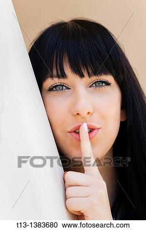 Silence please young woman portrait View Large Photo Image Stock Image - Silence please young woman portrait. Fotosearch