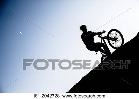 Silhouette biking btt decline in the Sierra de Cazorla, Andalucia, Spain View Large Photo Image Stock Photo - Silhouette biking btt decline in the Sierra de Cazorla, Andalucia, Spain. Fotosearch