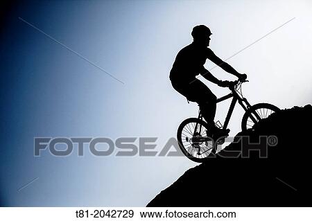 Silhouette biking btt decline in the Sierra de Cazorla, Andalucia, Spain View Large Photo Image Stock Photo - Silhouette biking btt decline in the Sierra de Cazorla, Andalucia, Spain. Fotosearch