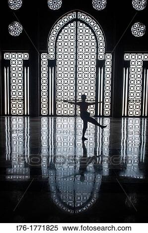 Stock Photography - silhouette in the interior of the amazing Hassan II Mosque in Casablanca, Morocco. Fotosearch