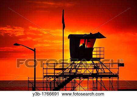Silhouette of a Lifeguard Tower at Sunset View Large Photo Image Stock Image - Silhouette of a Lifeguard Tower at Sunset. Fotosearch