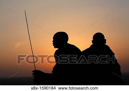 Silhouette of a Maasai men, Ngogongoro conservation Area, Tanzania View Large Photo Image Picture - Silhouette of a Maasai men, Ngogongoro conservation Area, Tanzania. Fotosearch