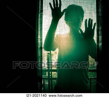 Silhouette of a man and his hands behind a window. View Large Photo Image Stock Image - Silhouette of a man and his hands behind a window.. Fotosearch