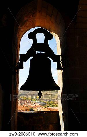 Stock Image - Silhouette of a small bell, Bell Tower in the cathedral of Siguenza, province of Guadalajara, Castilla La Mancha, Spain. Fotosearch